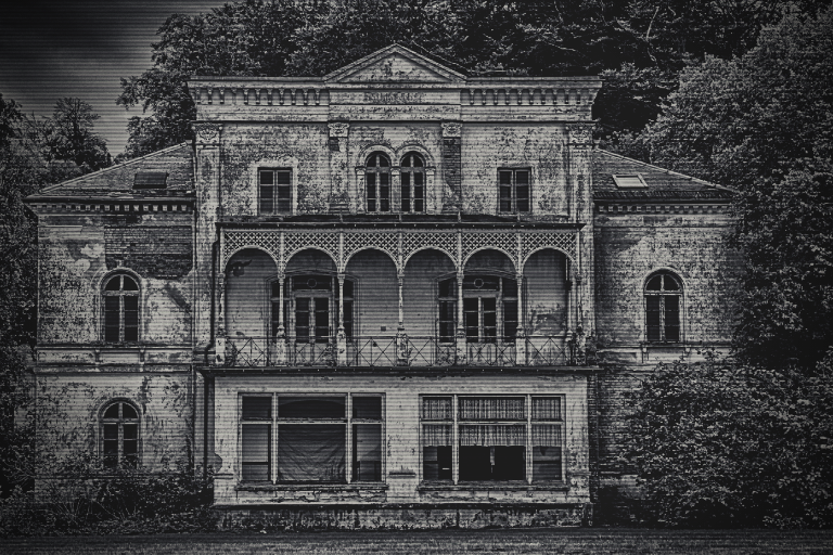 old three-story house in disrepair