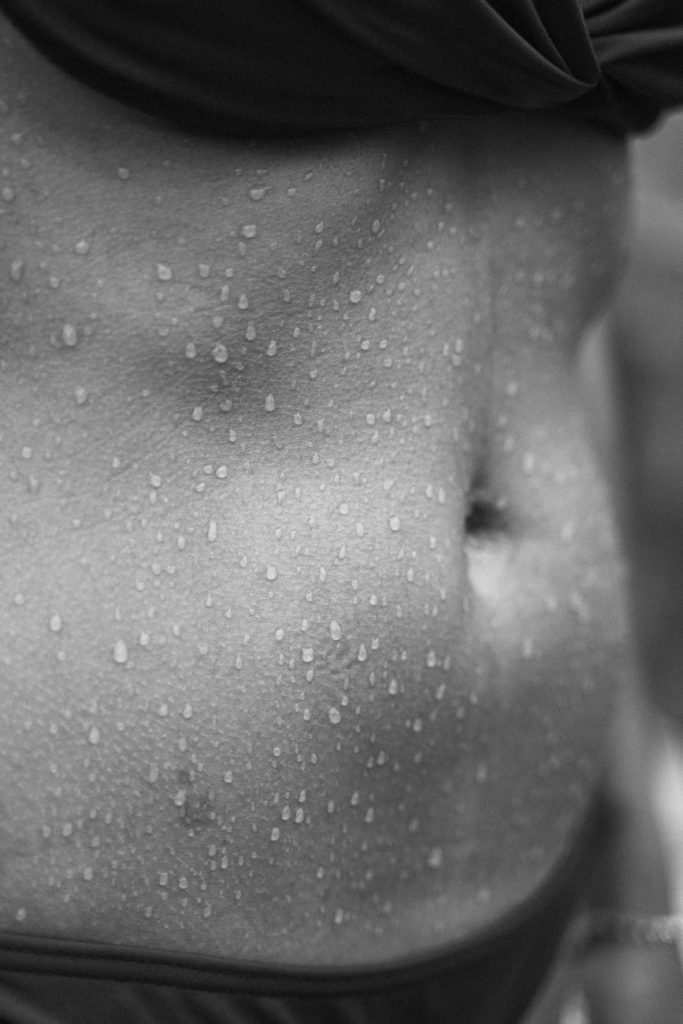 grayscale photo of a wet stomach